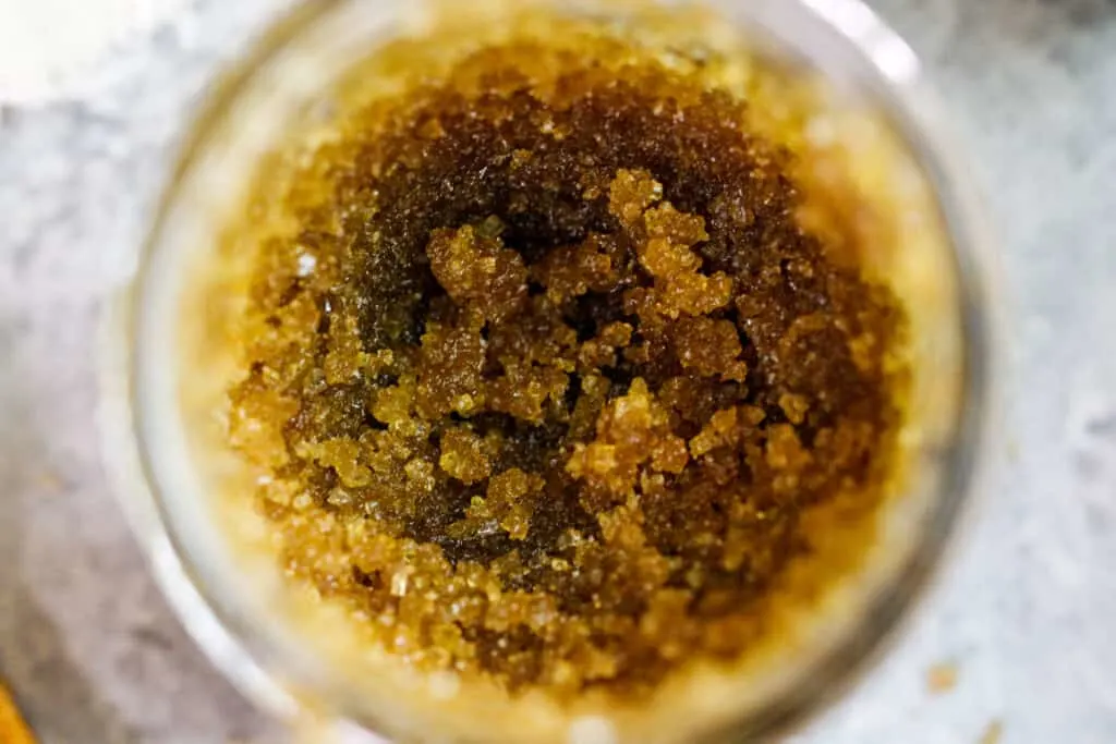 image of a brown sugar body scrub made in a mason jar