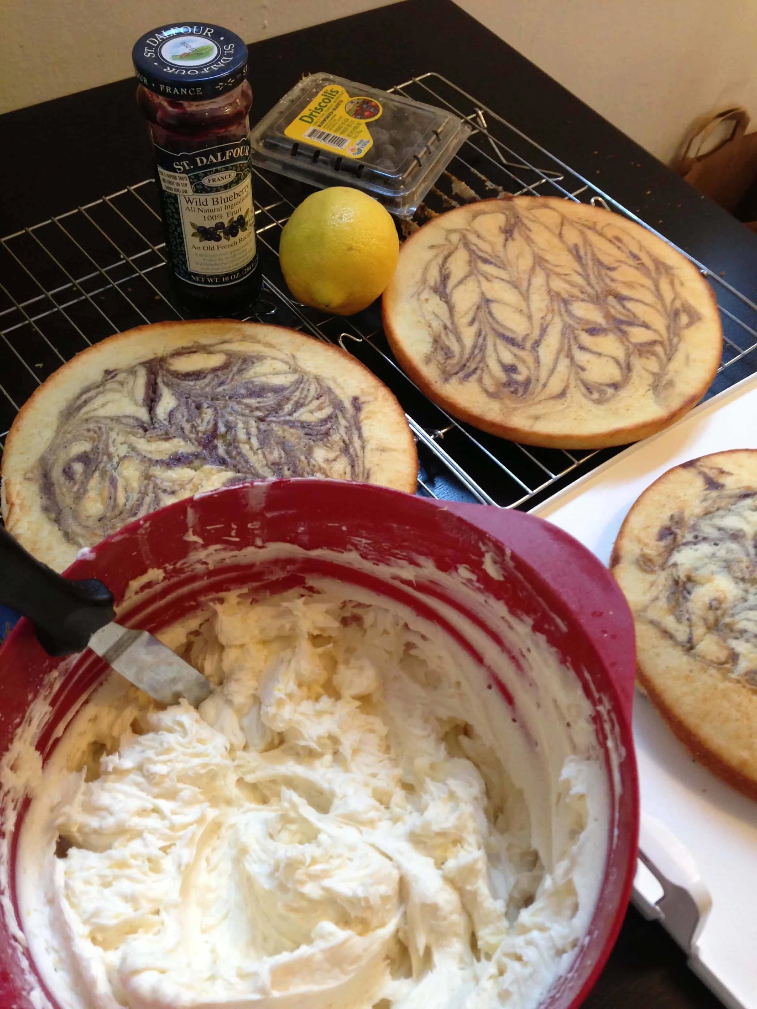 image of lemon and blueberry swirled cake layers to make a lemon blueberry cake