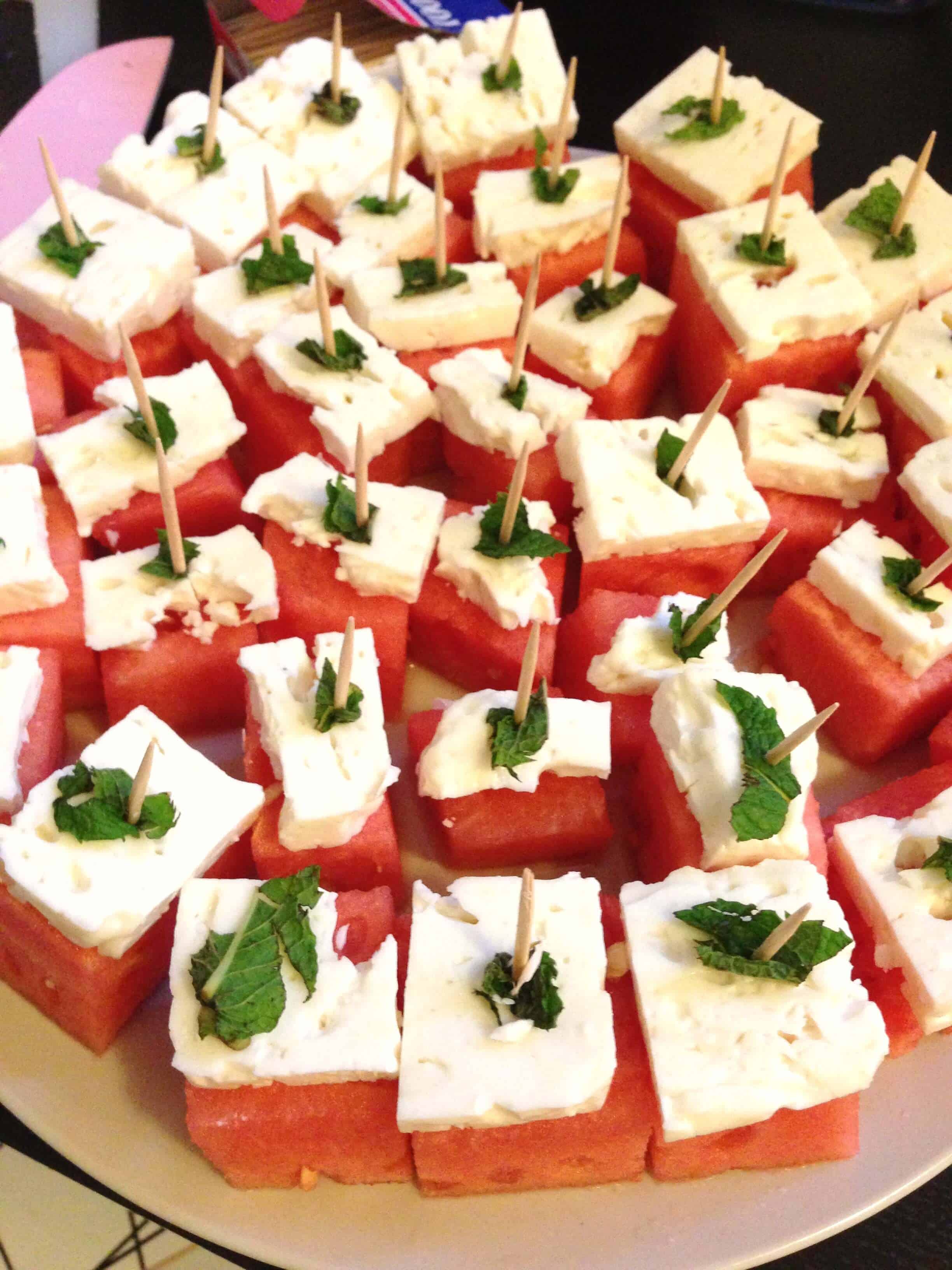 image of watermelon feta bites garnished with a bit of fresh mint