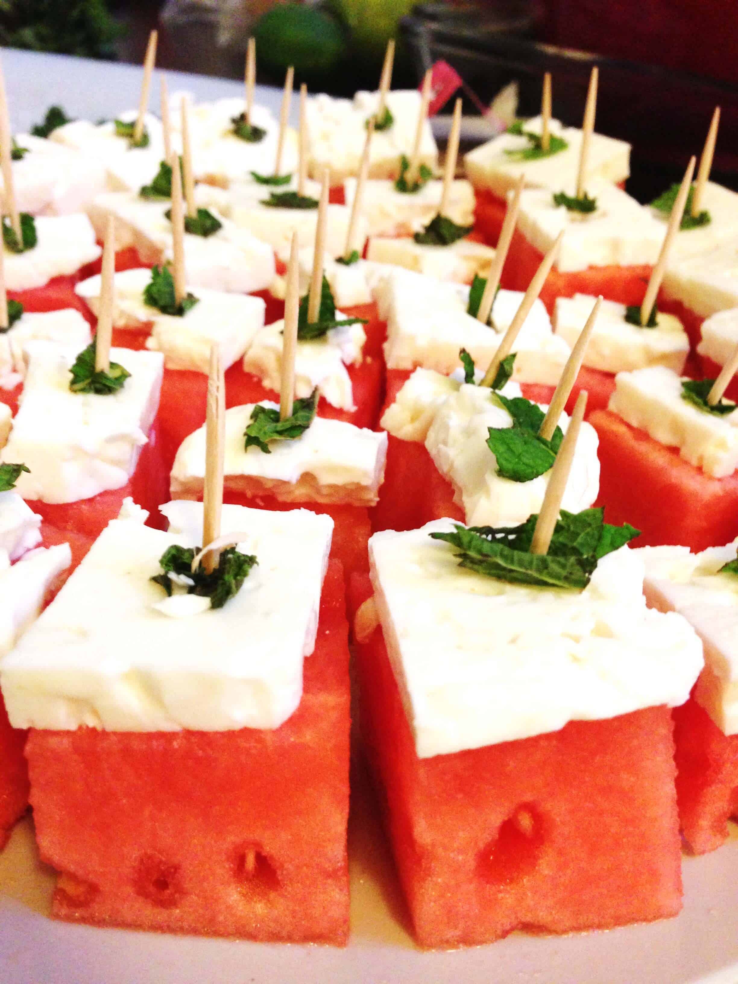 Image of watermelon feta bites garnished with a bit of fresh mint