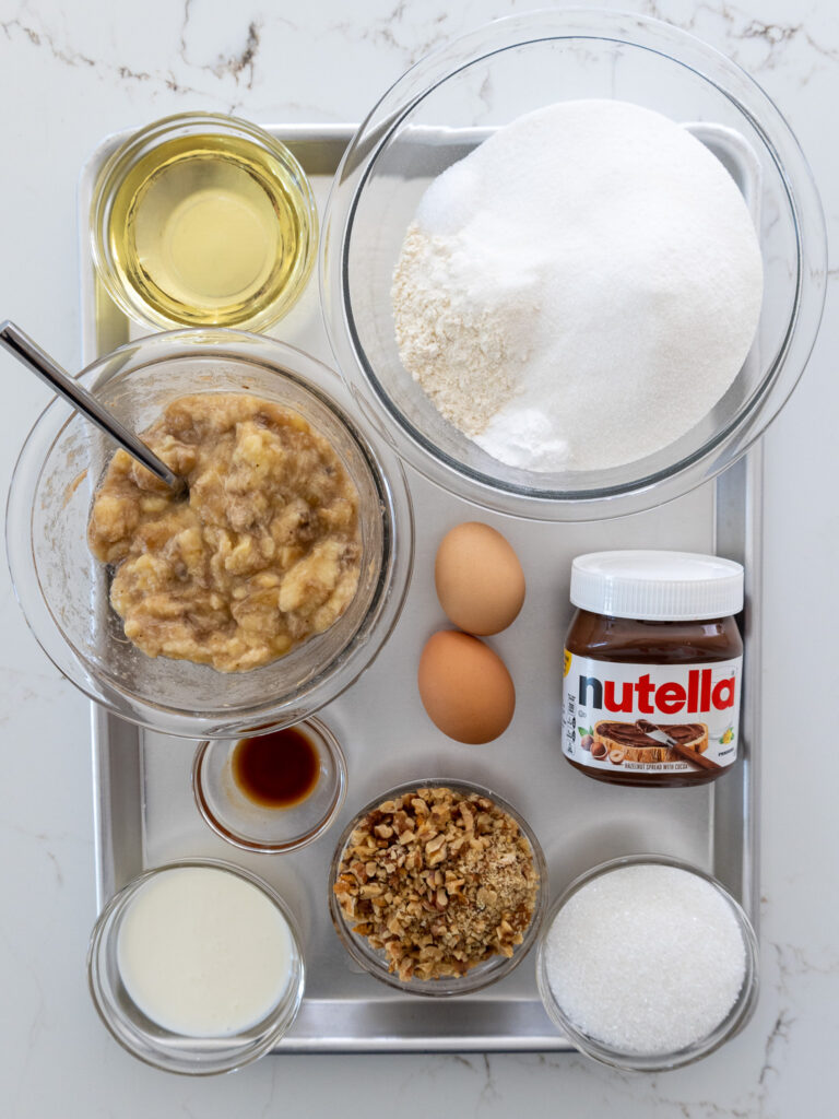 image of ingredients laid out to make nutella banana nut muffins