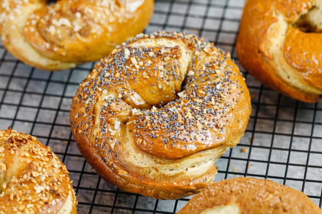 image of homemade bagels cooling on a wire rack