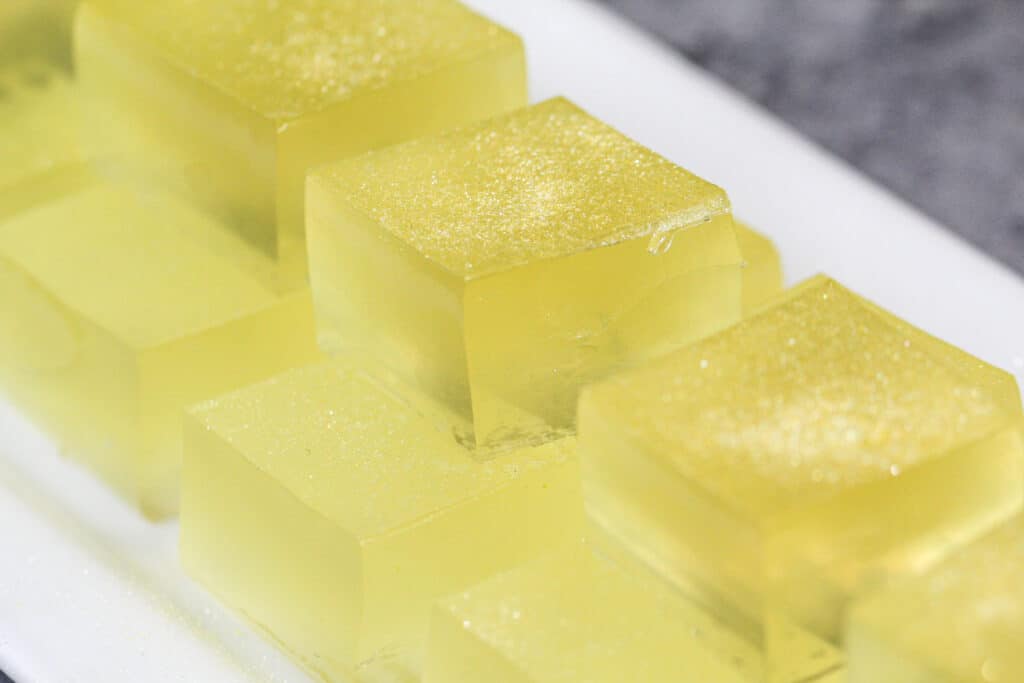 image of a tray of champagne jello shots made to celebrate new years eve