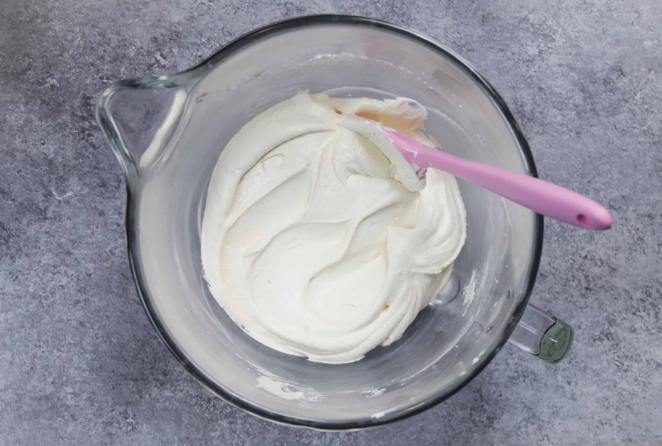 image of smooth american buttercream frosting in bowl