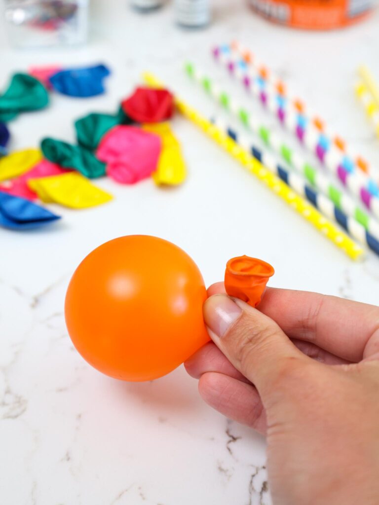 image of a small balloon being partially inflated so that it's circular