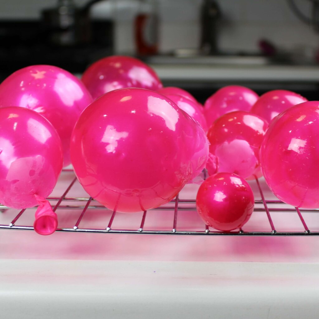 image of edible bubbles that have been made using gelatin and small balloons