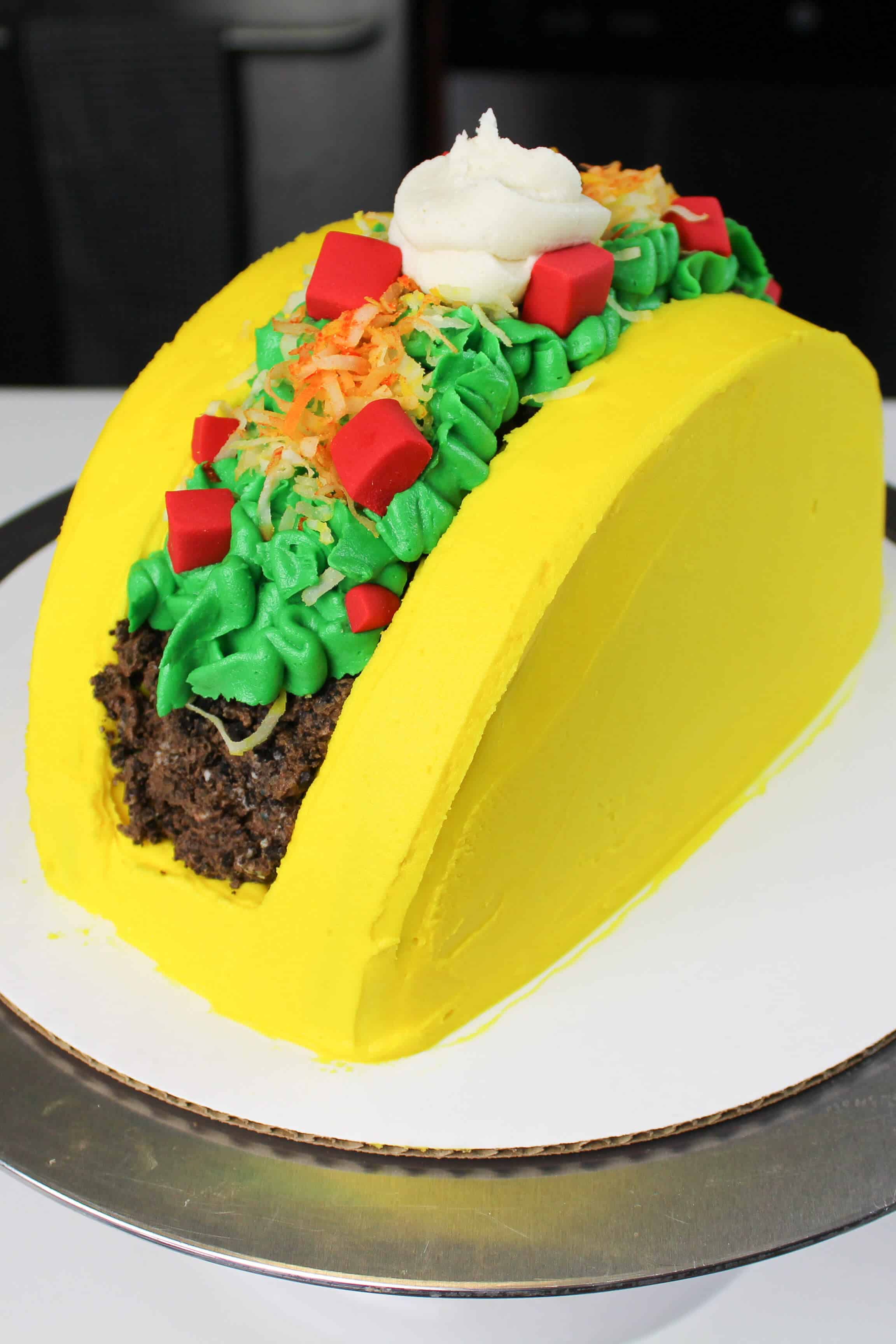This taco cake is easier to make than you'd think! This post shares the full recipe and tutorial for it!!