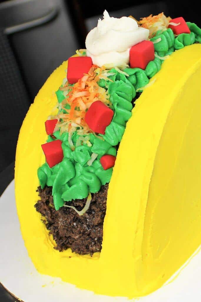 This taco cake is primarily made with buttercream, and is perfect for cinco de mayo, or even a taco Tuesday!!
