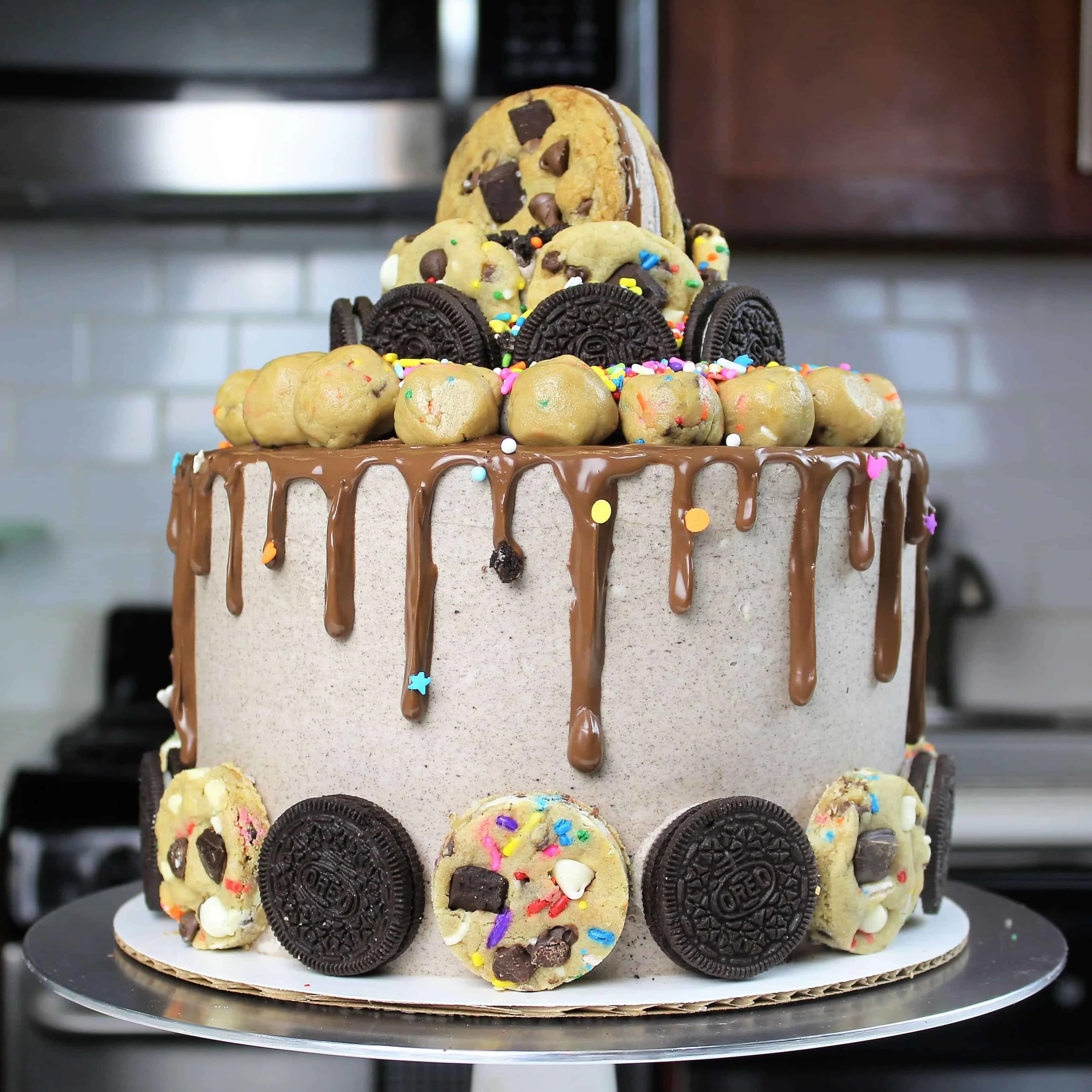 oreo cooke dough cake decorated with nutella buttercream and a nutella drip!