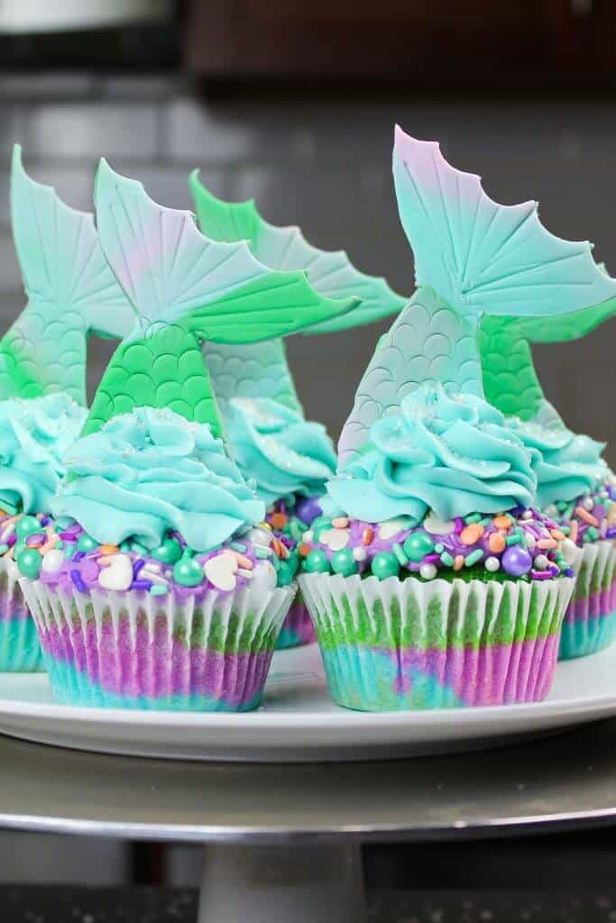 Mermaid Tail Cupcakes, made with fancy sprinkles and fondant tails