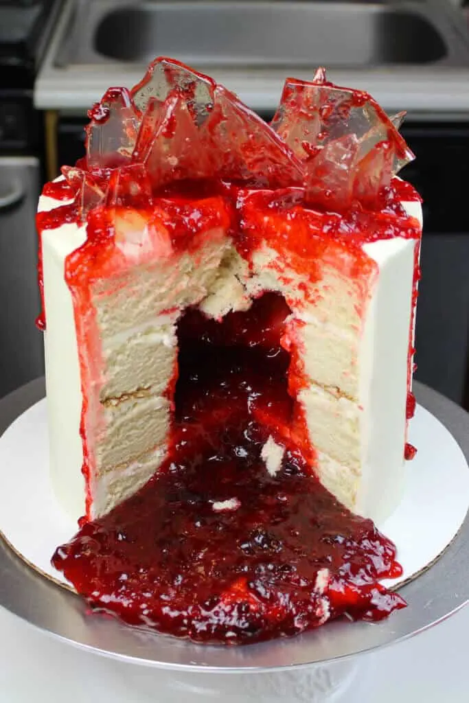 image of shattered glass cake, filled with strawberry jam to look like blood