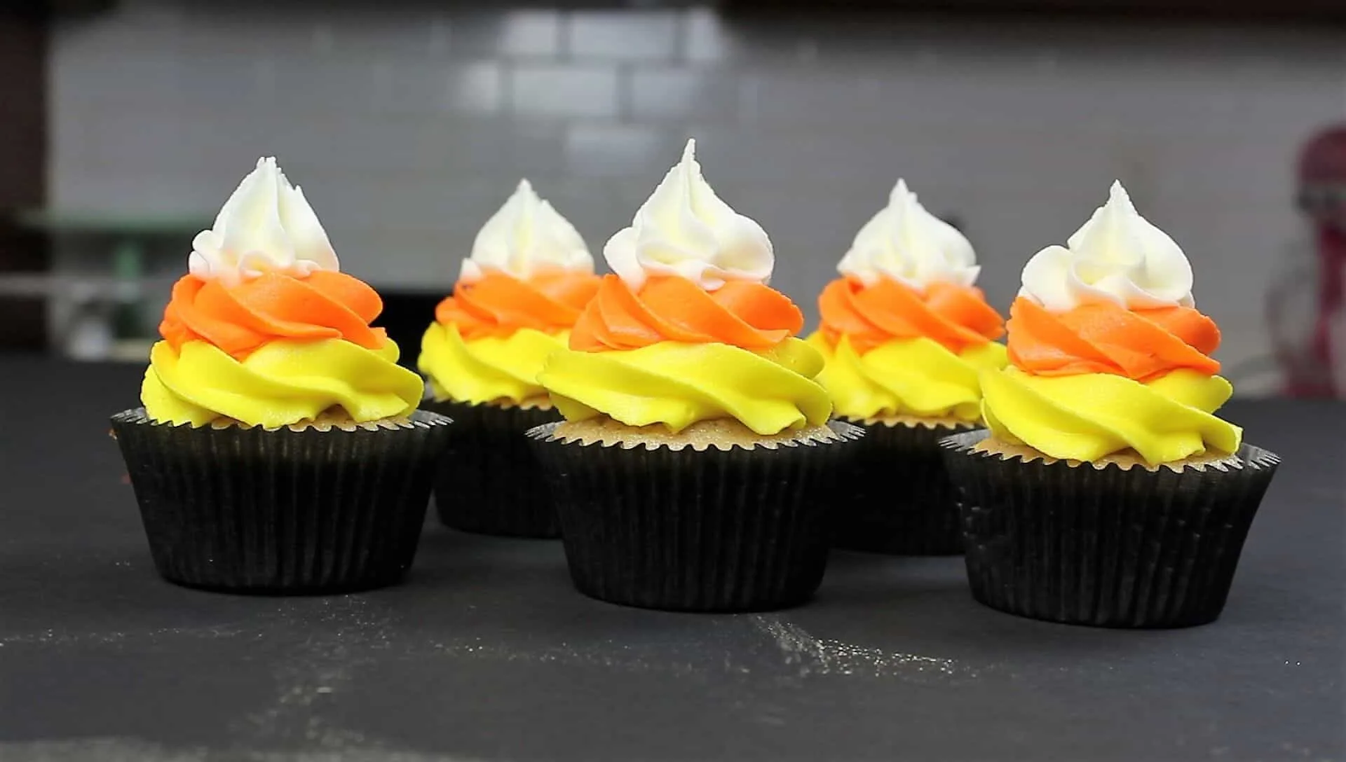 photo of chelsweets candy corn cupcakes