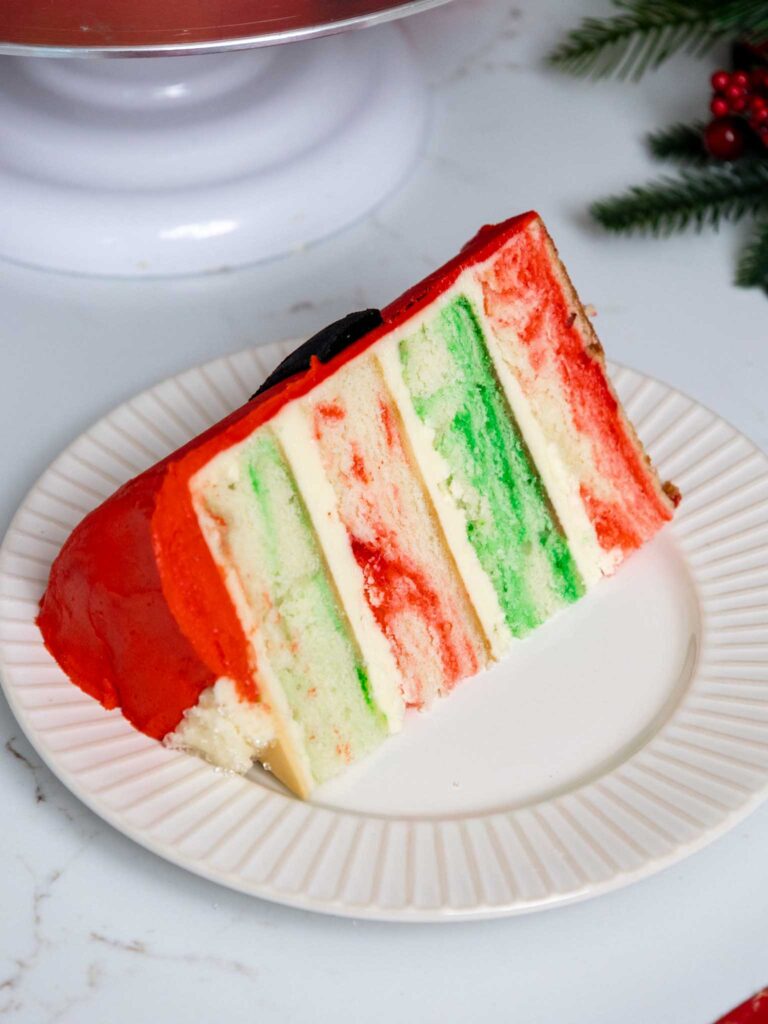 image of a slice of red and green marbled cake layers