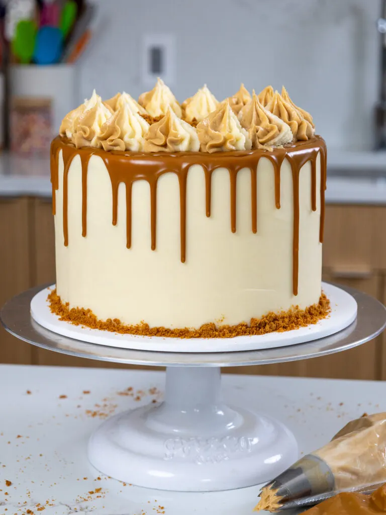 image of a biscoff cake decorated with a cookie butter drip