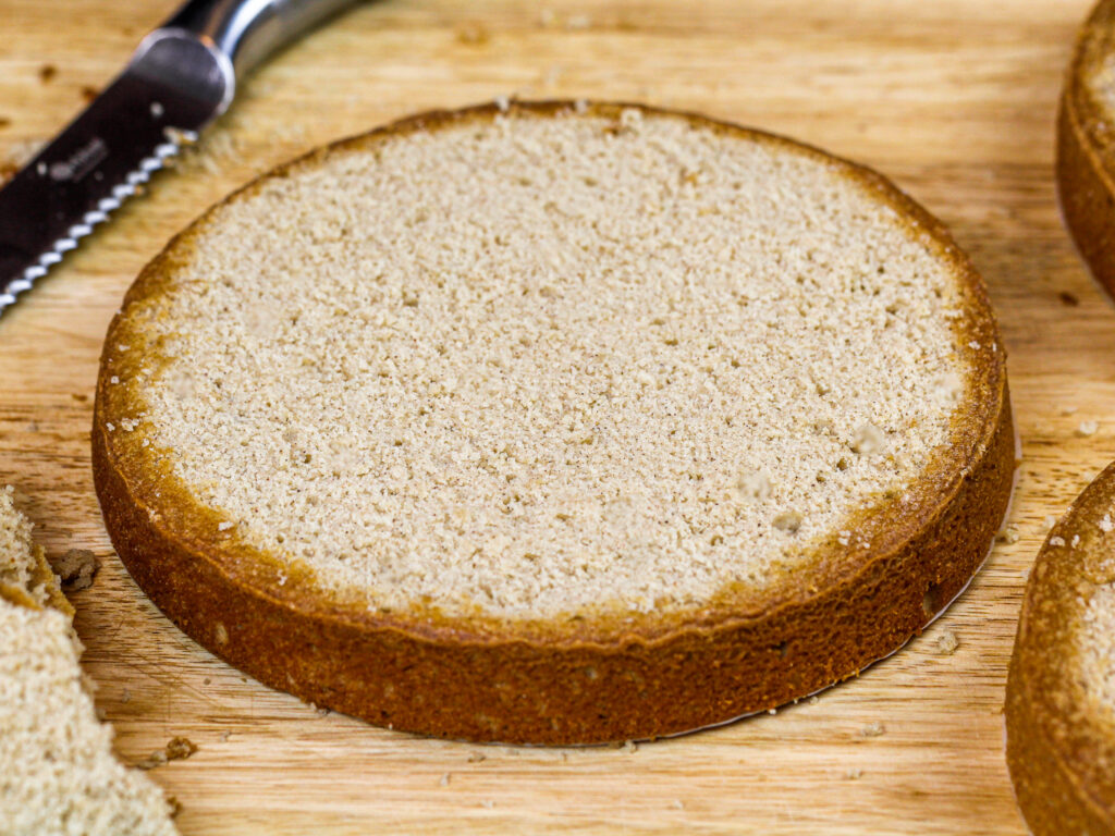 image of a spice cake layer that's been leveled with a serrated knife