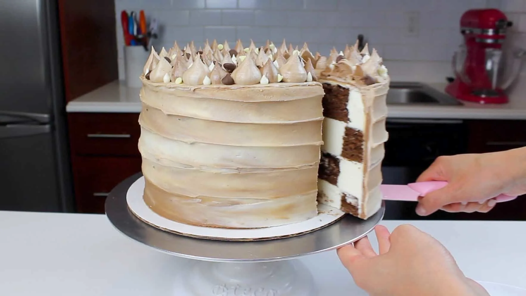 sneak peak at inside of cut checkerboard cake-2