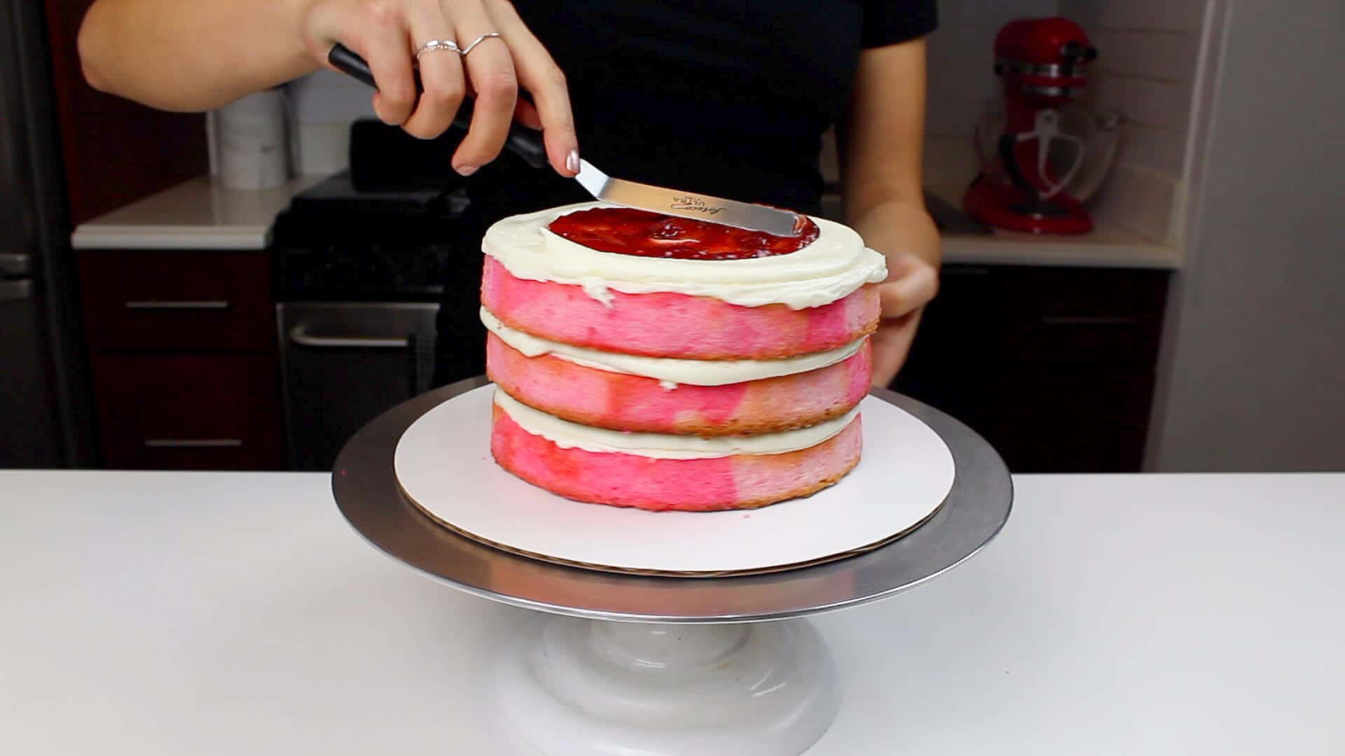 adding jam between cake layers
