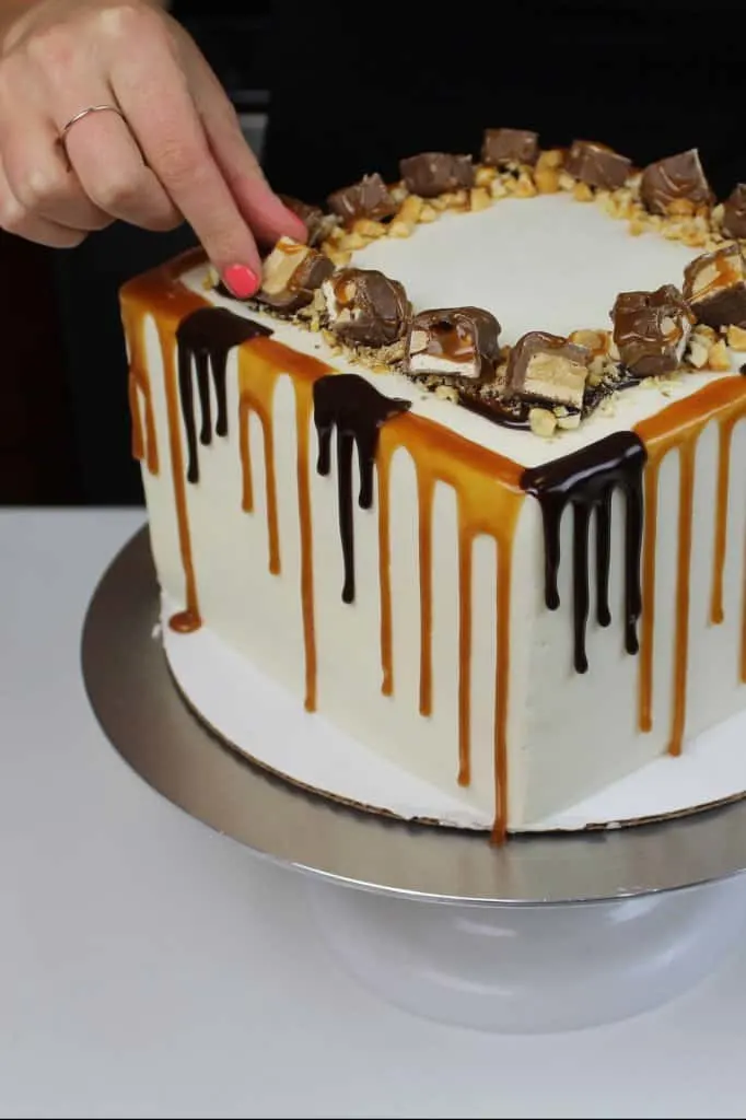 chocolate and caramel snickers drip cake