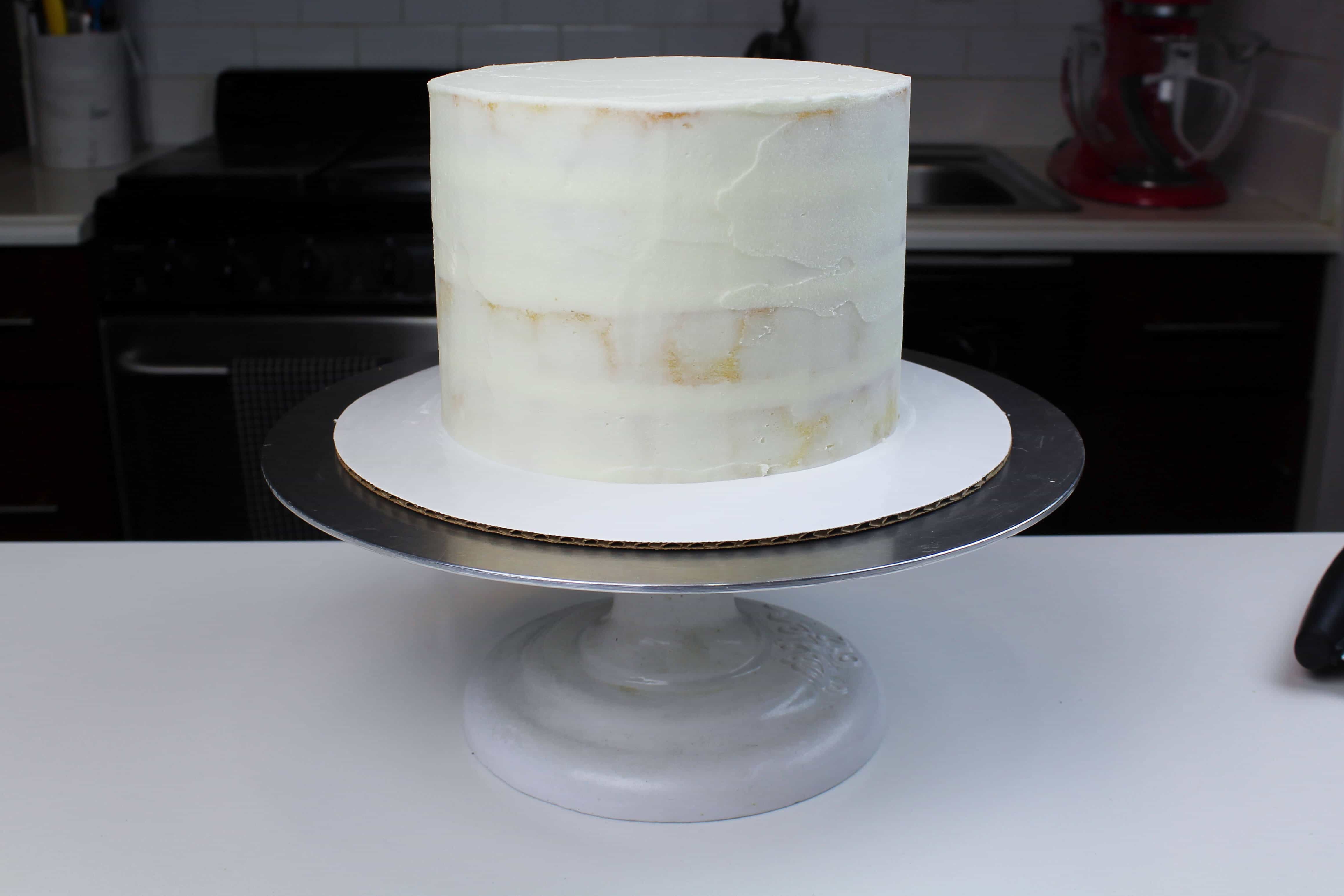 crumb coated white velvet sweater cake-2