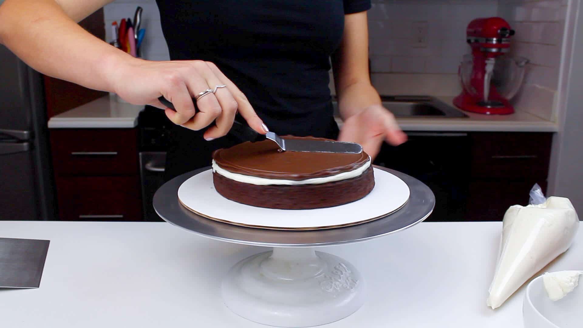 spreading ganache onto hot cocoa cake-2