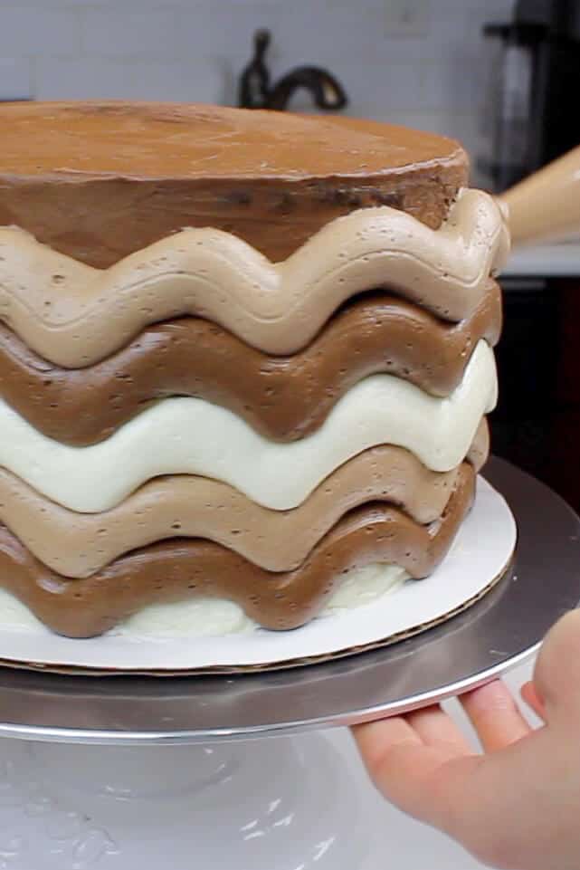 adding ripple frosting to my marble cake