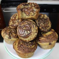 image of banana nutella muffins stacked on a plate