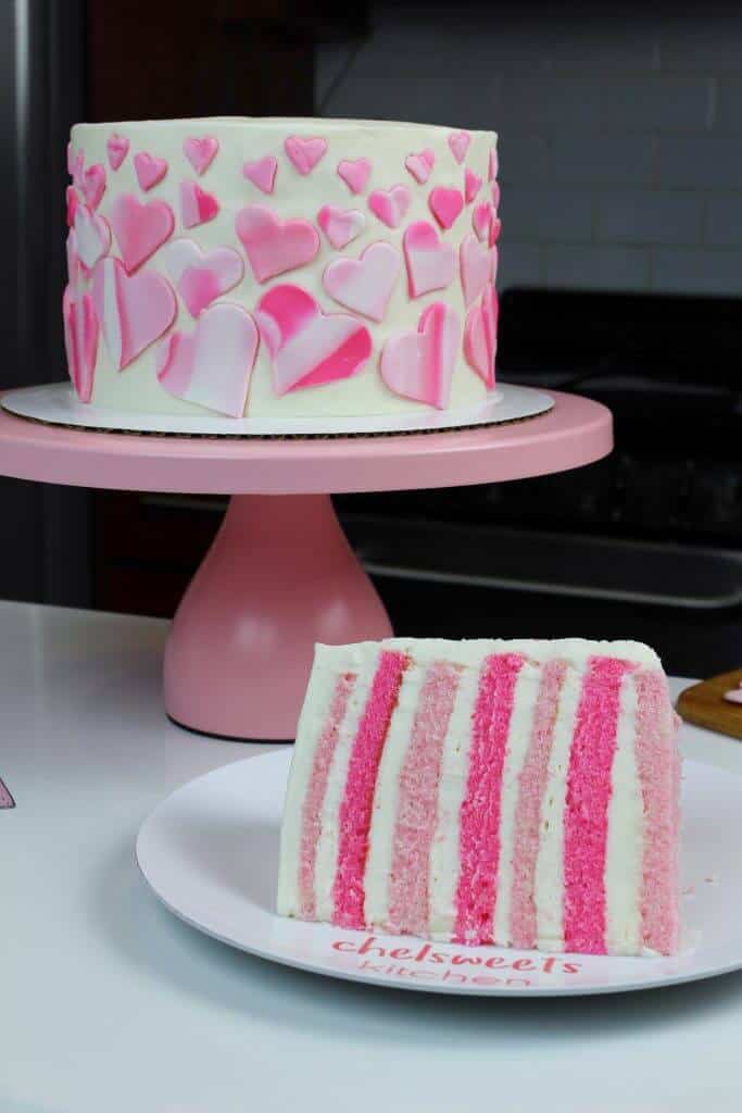 image of pink velvet layer cake made with marbled fondant hearts