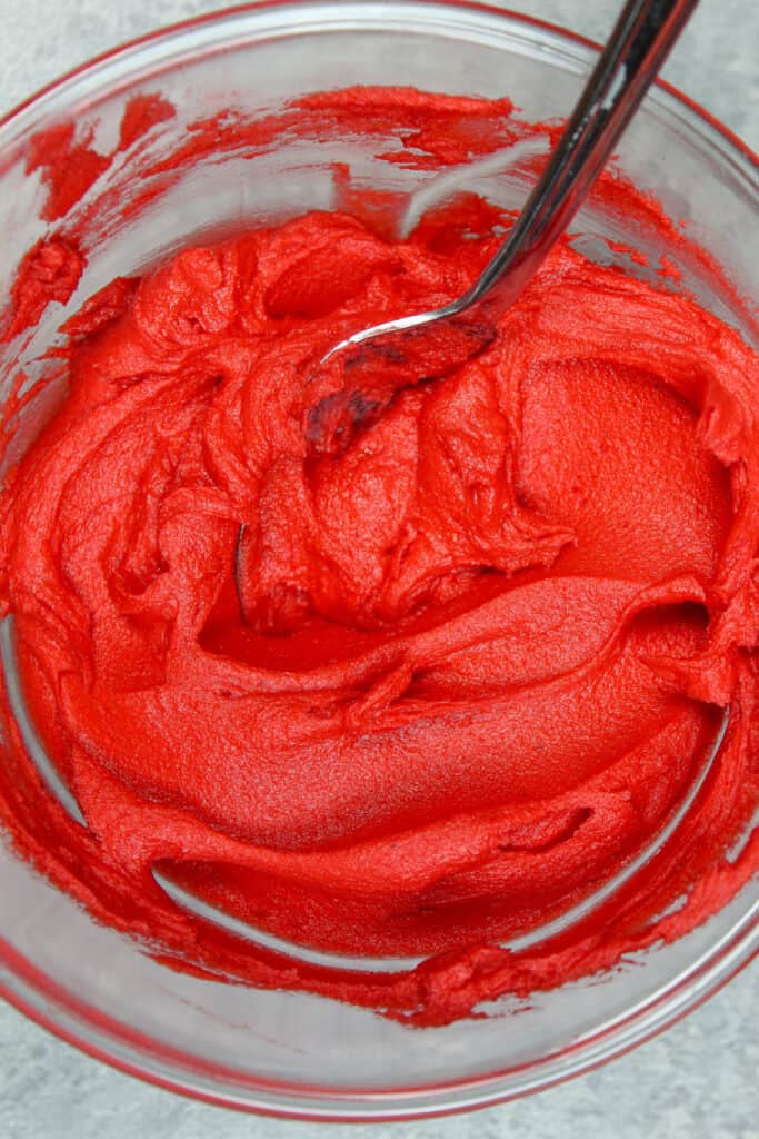 close up photo of bright red buttercream