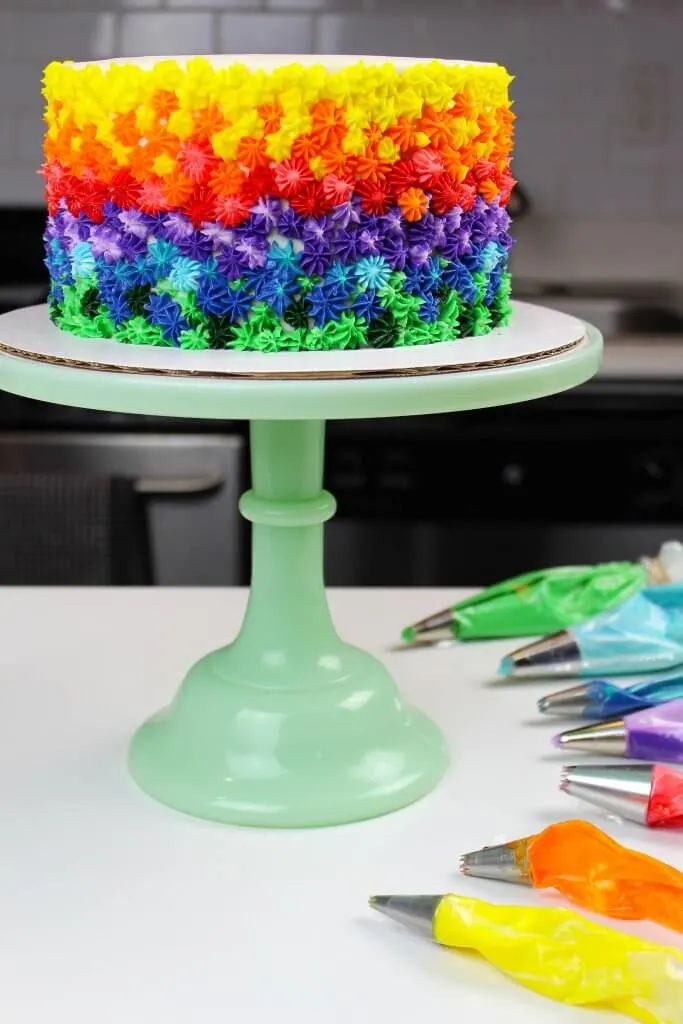 Photo of rainbow buttercream cake