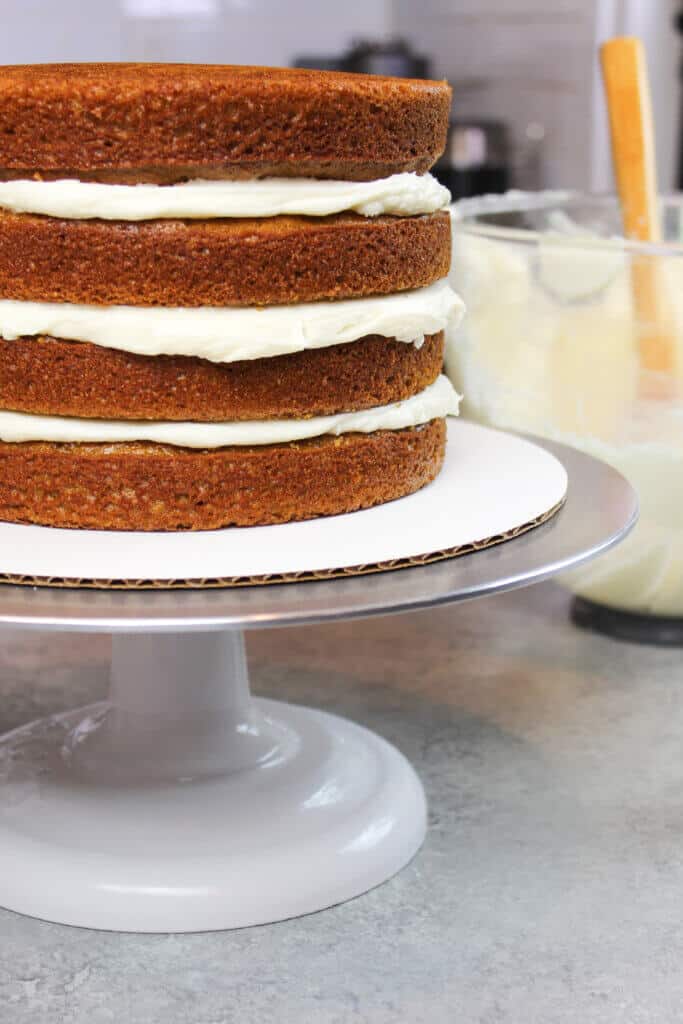 unfrosted carrot cake, stacked and filled