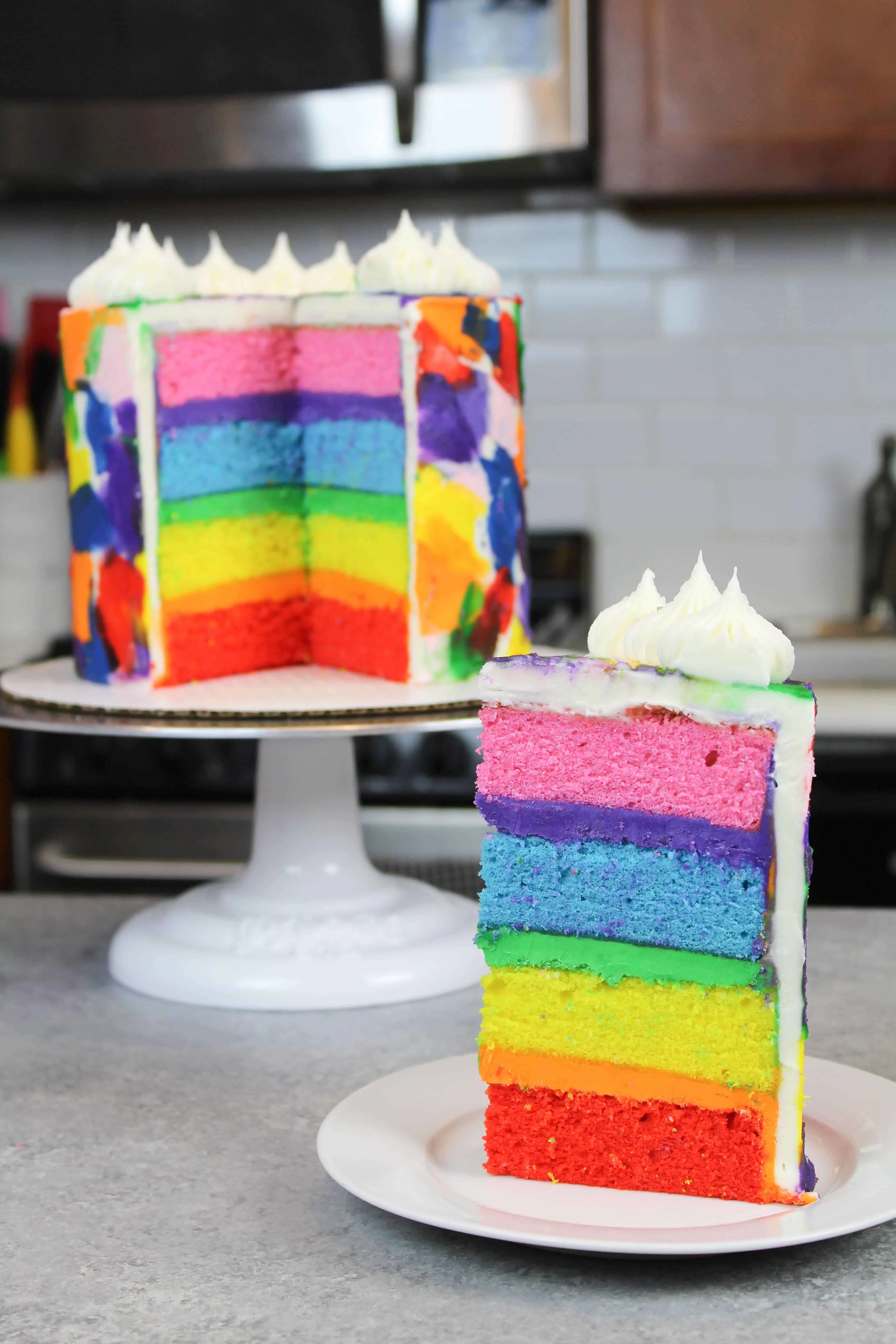 Rainbow layer cake recipe made with 4 cake layers