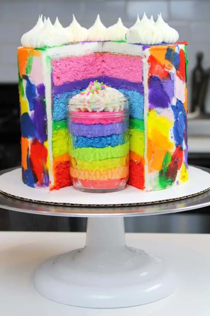 rainbow layer cake with jar of cake