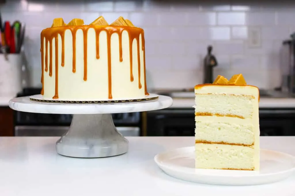 sliced caramel drip cake photo