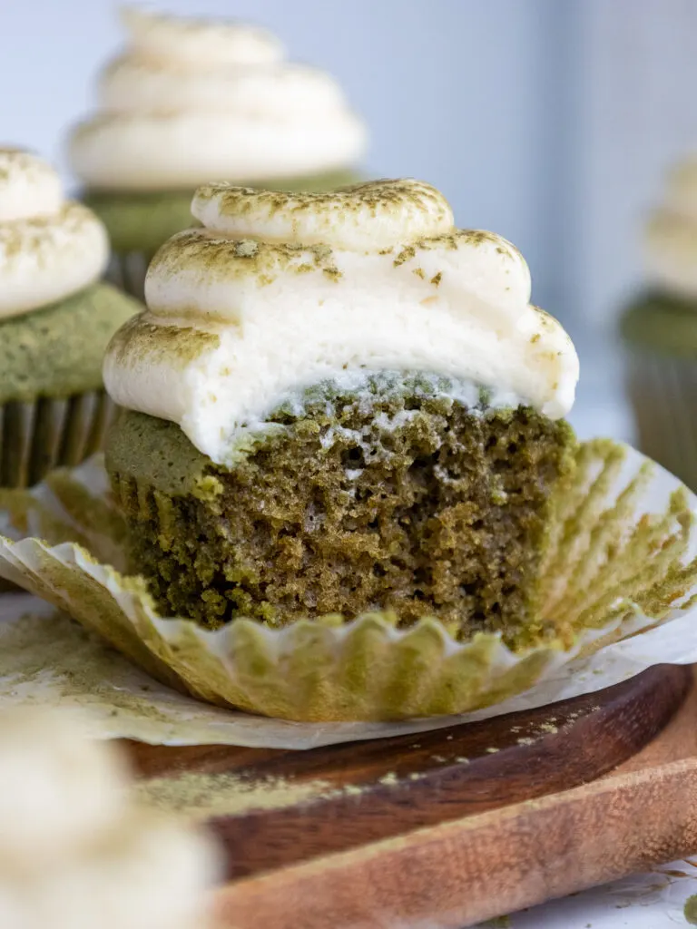image of a matcha cupcake that's been cut open to show its tender crumb