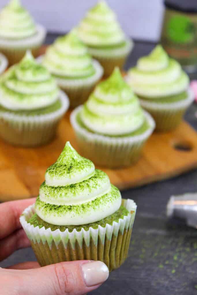 holding up one of my matcha cupcakes