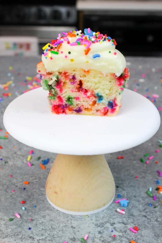 image of funfetti cupcake, cut in half to show tender crumb