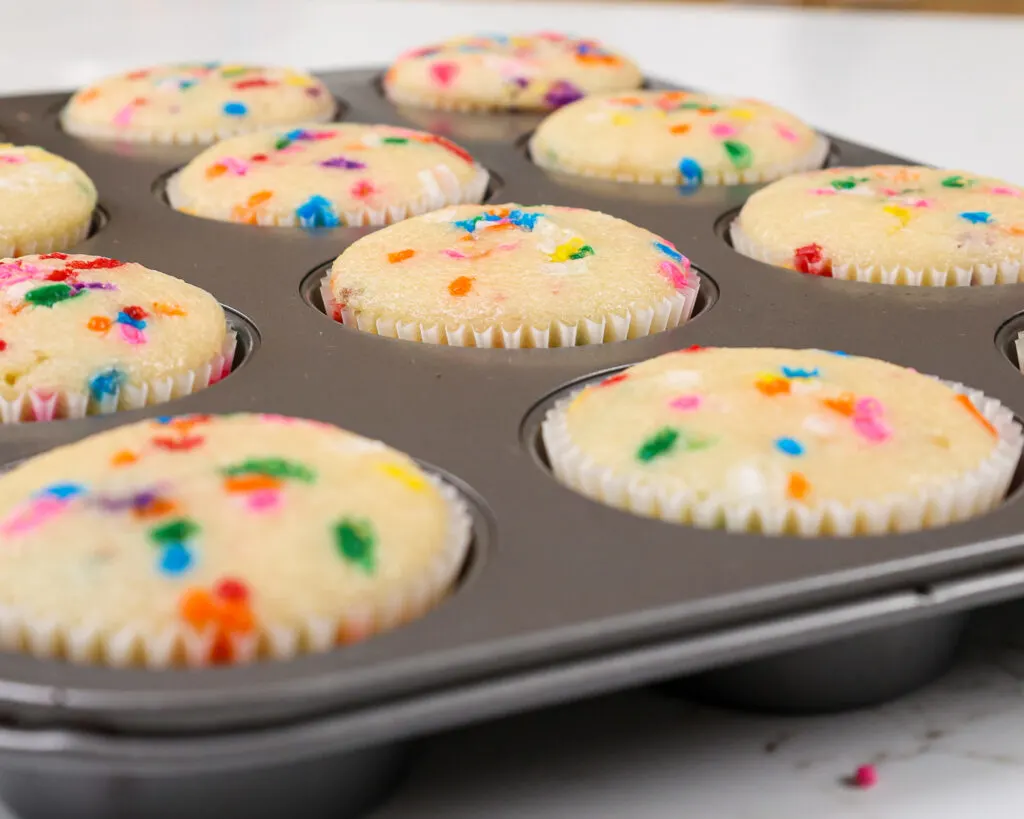 image of funfetti cupcakes that have been baked and are ready to be frosted