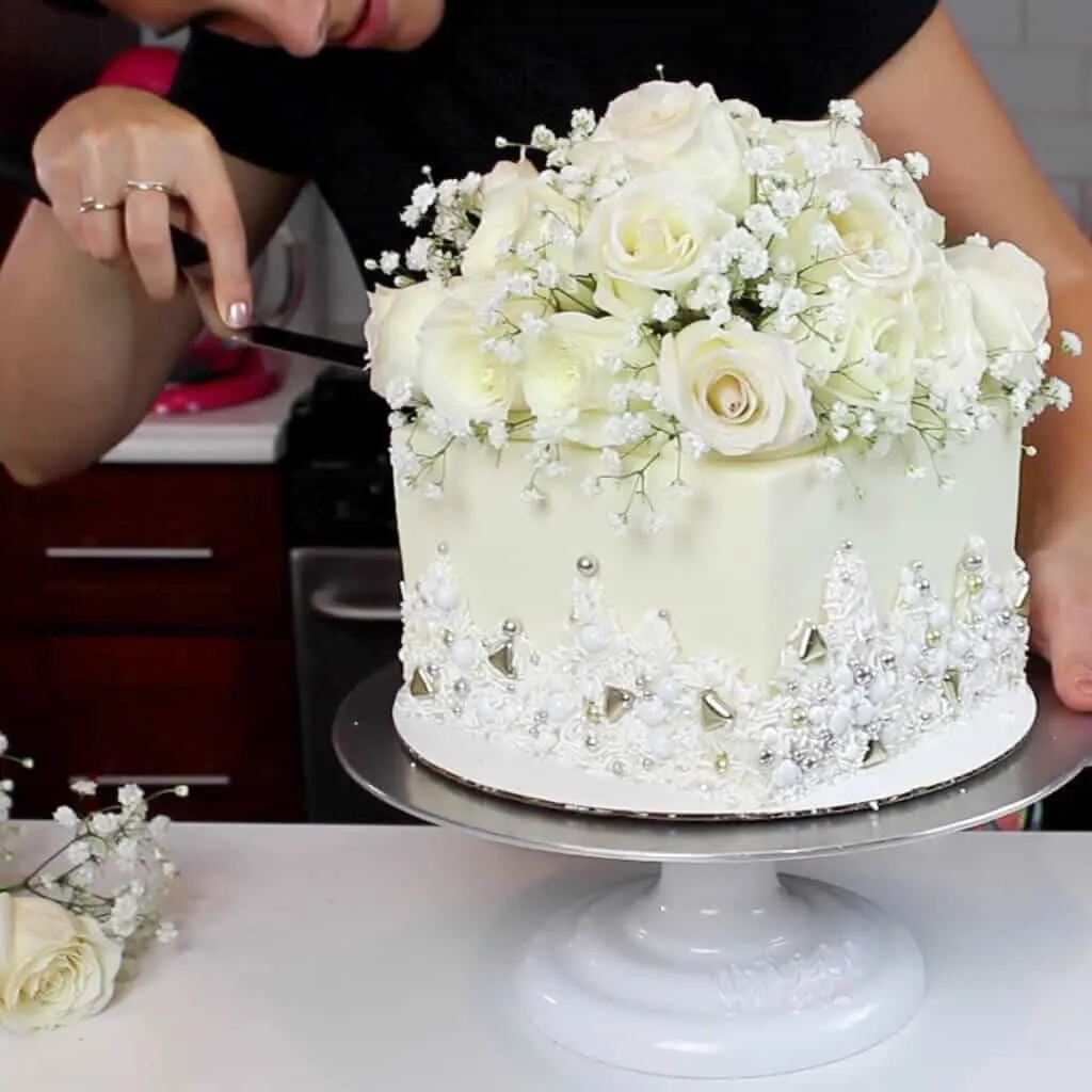 photo of easy method used to add fresh flowers on a cake