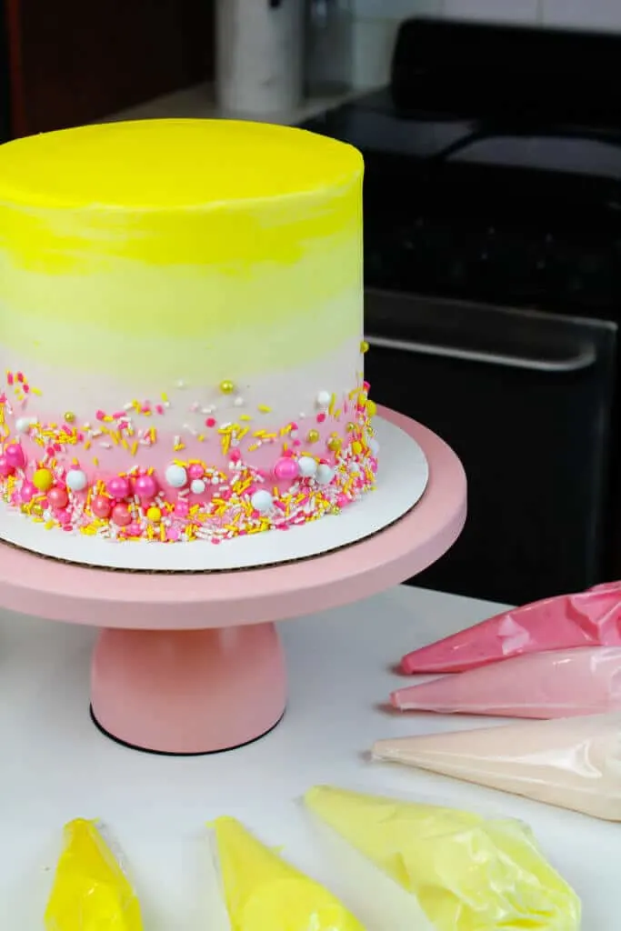 Frosted pink lemonade cake with pretty sprinkle blend sweetapolita