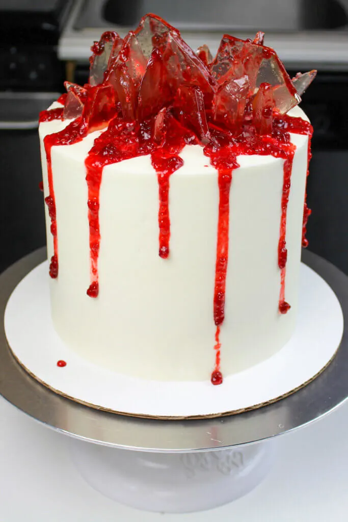 image of shattered glass cake made with sugar glass and strawberry jam