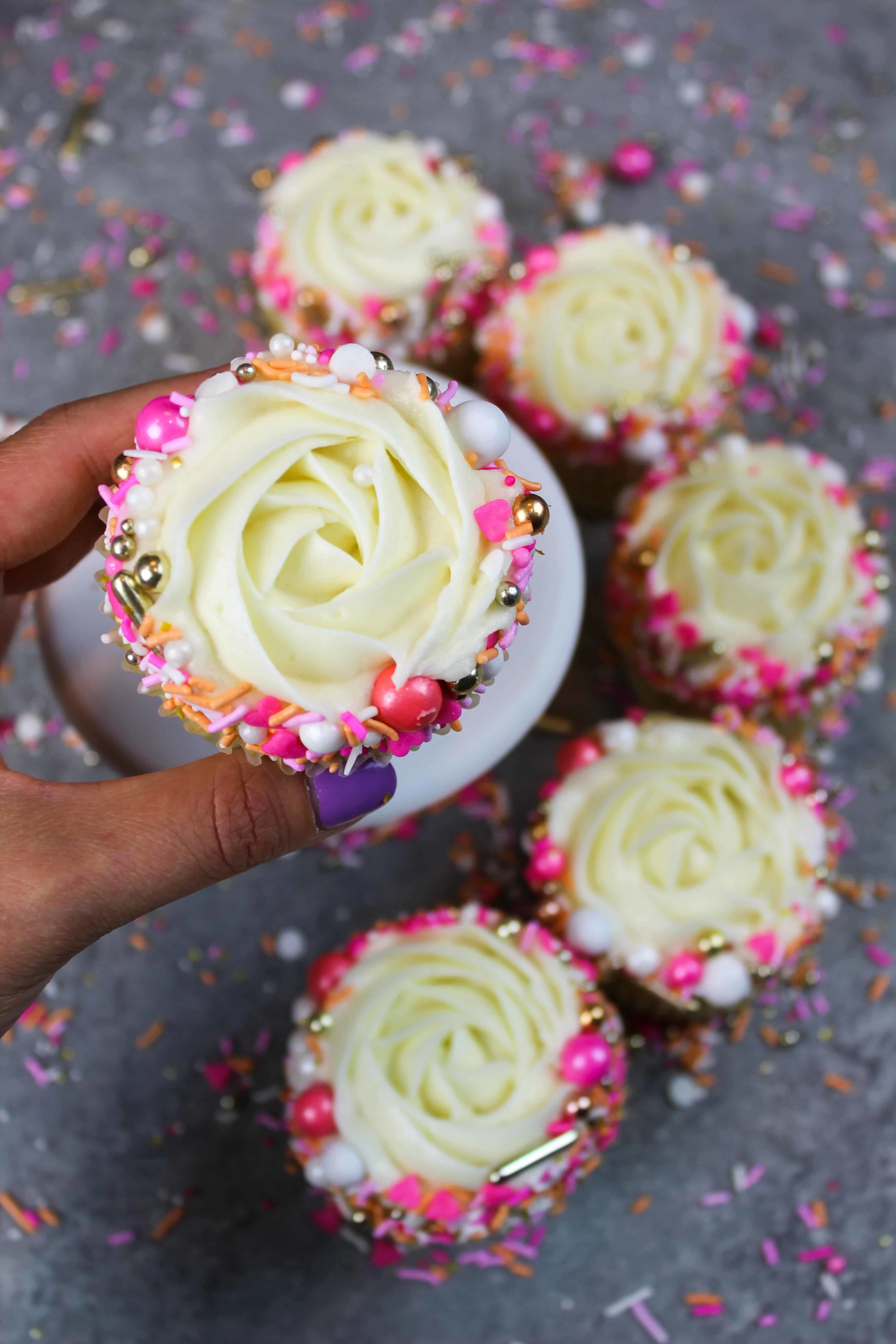 image of cupcakes decorated with buttercream rosettes