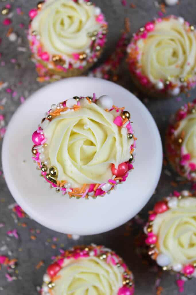 image of rosewater cupcakes, decorated with buttercream rosettes and sweetapolita sprinkles