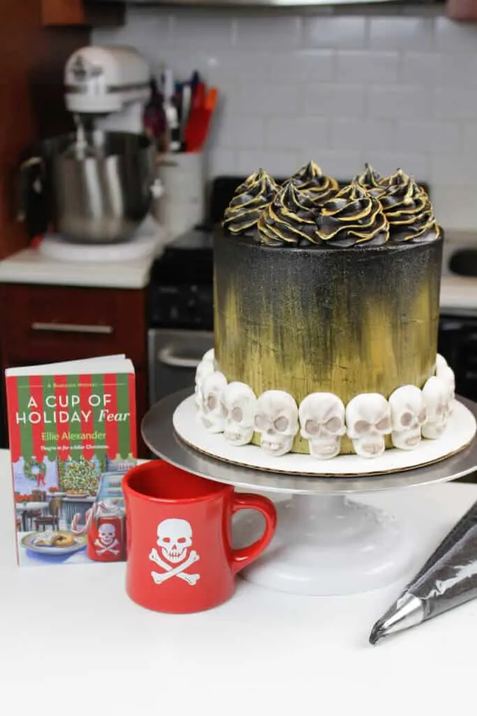 image of black velvet cake decorated with skulls