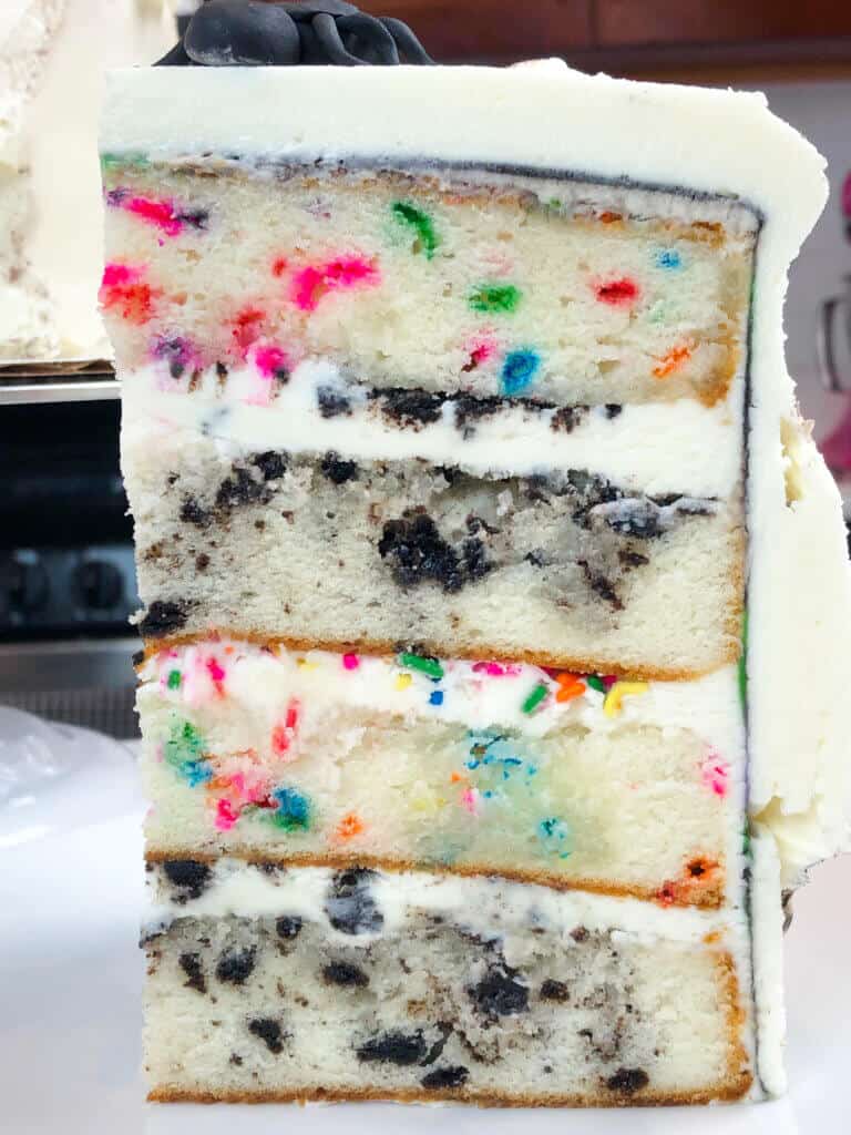 image of cake slice with funfetti and oreo cake layers