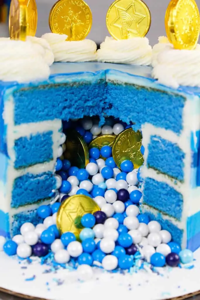 kah cake, filled with blue and white sprinkles and gelt

