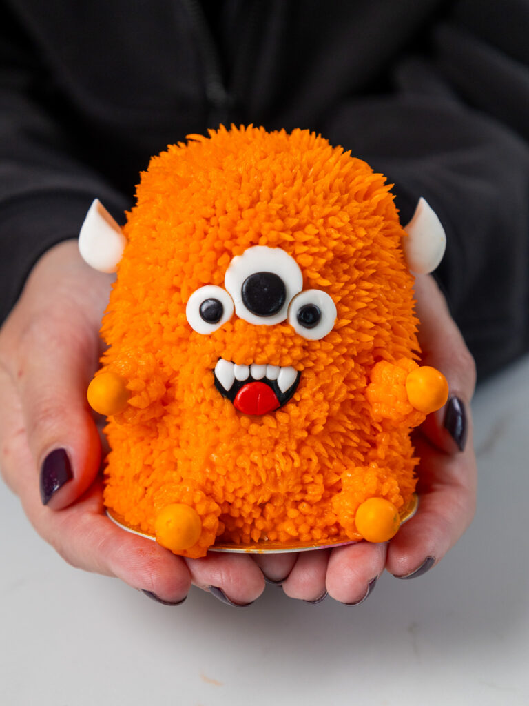 image of an adorable mini monster cake that's been made with cupcakes
