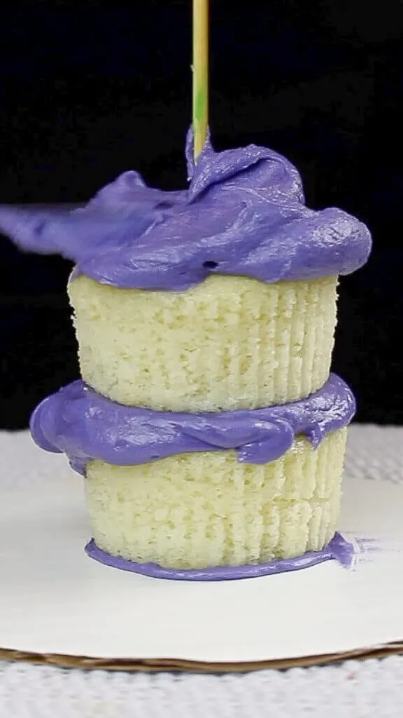 image of stacked cupcakes supported with central skewer