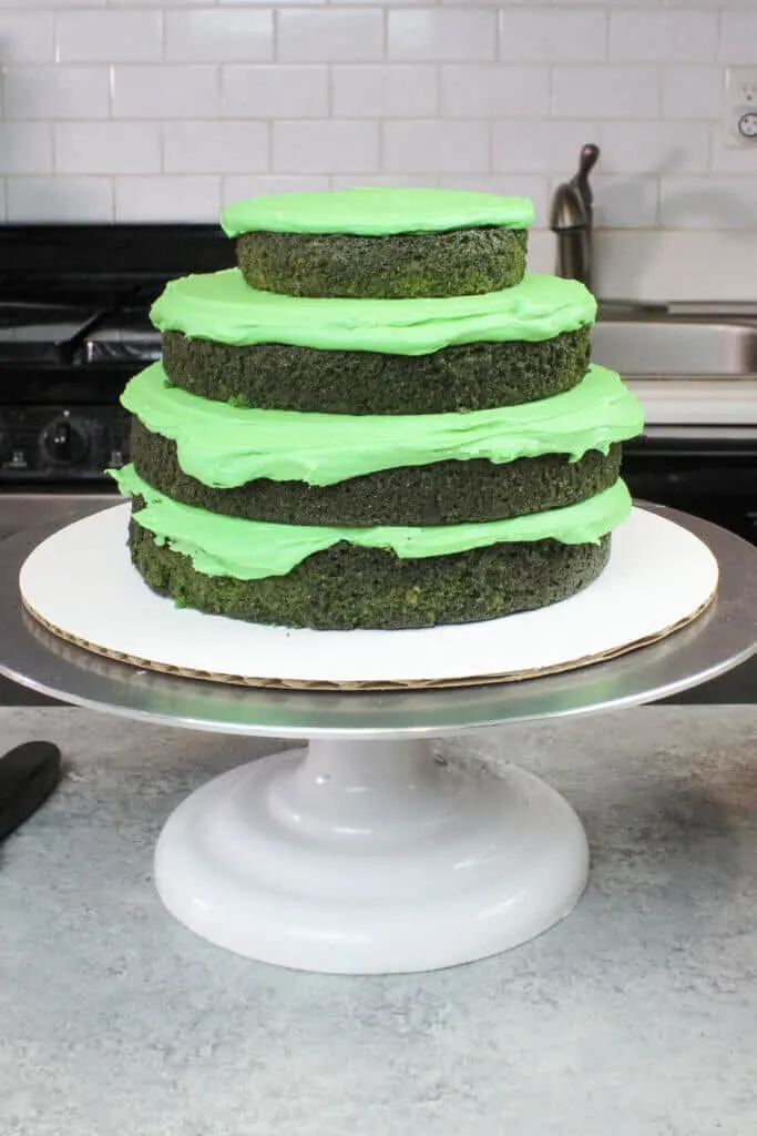image of stacked green velvet cake layers