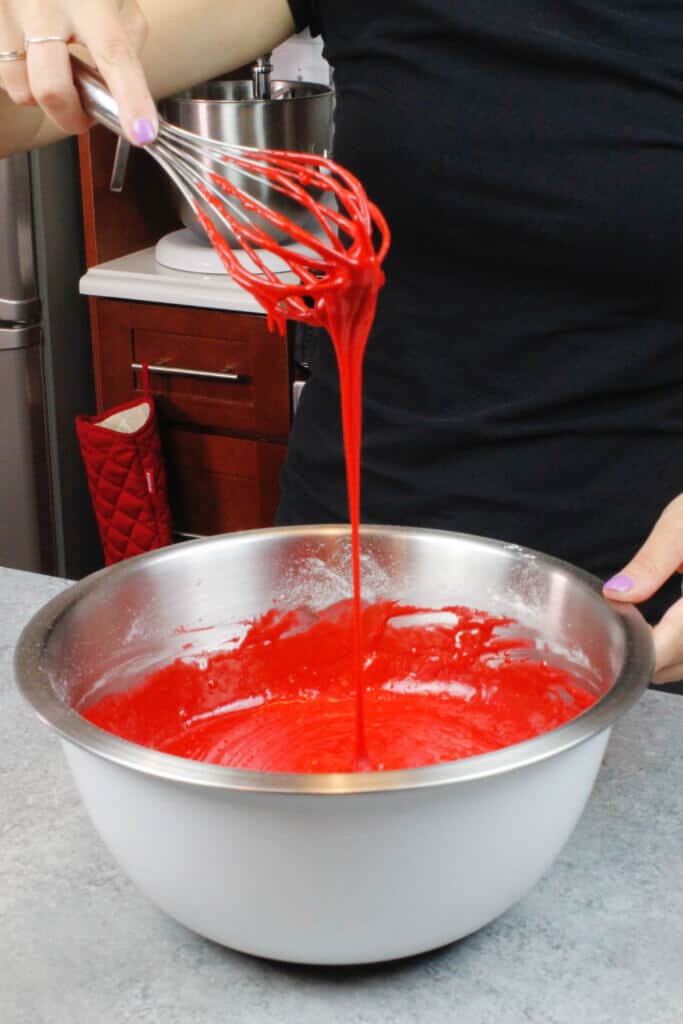 image of red velvet cake batter being whisked together