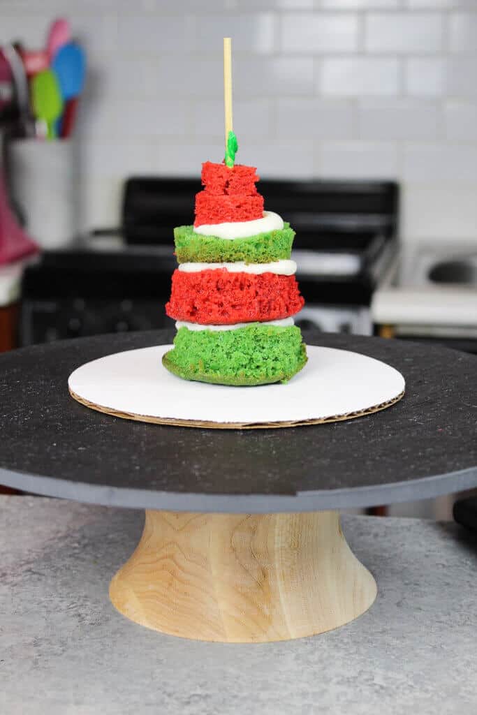 image of stacked cupcakes with skewer in the middle for stability